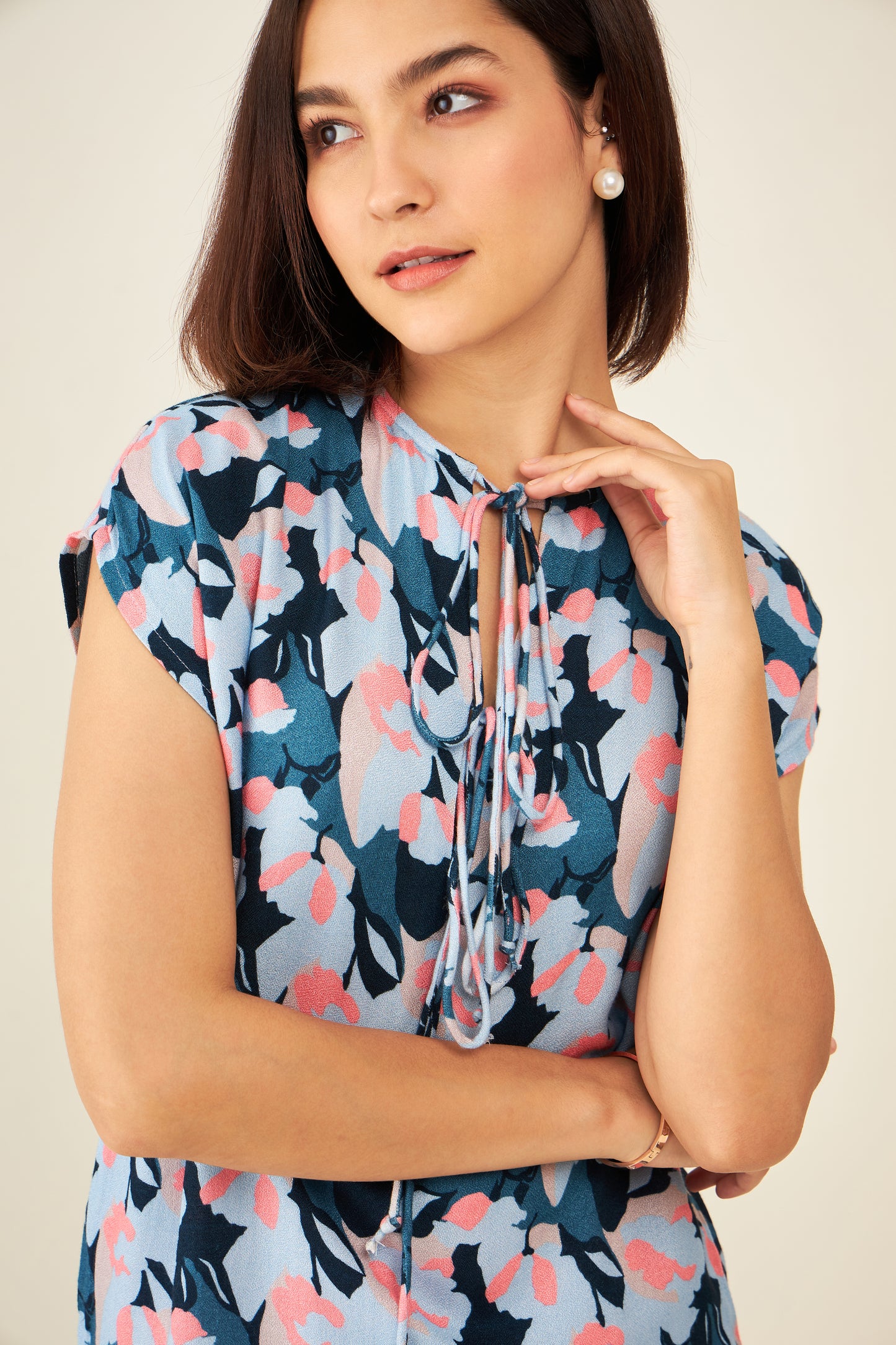 Floral print top with cap sleeves