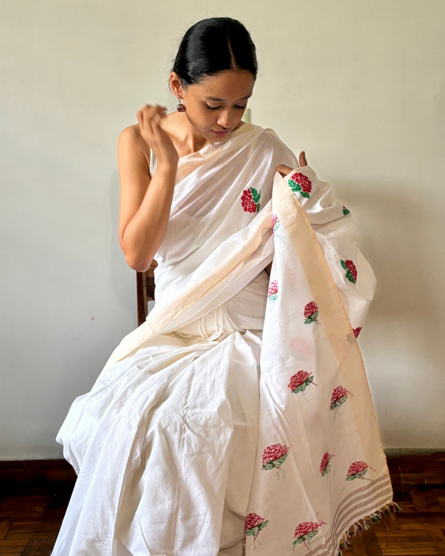 Coming up roses white cotton saree
