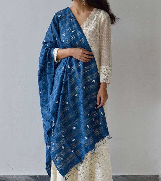 Blue Eri silk scarf with white motifs