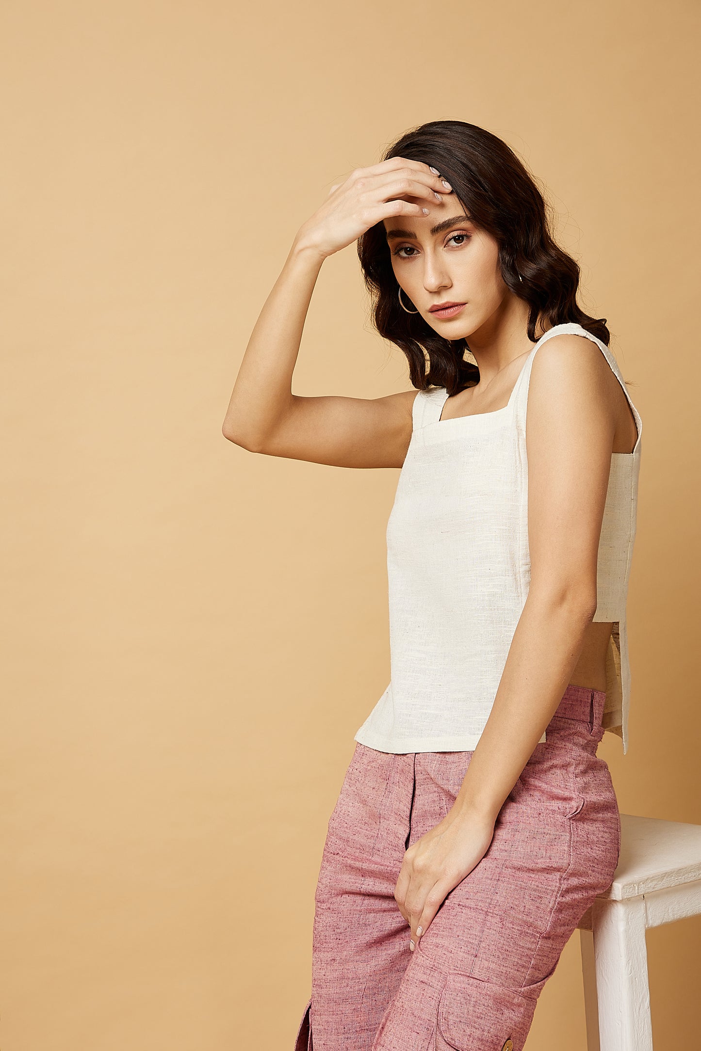 Sleeveless top with panelled sides in white