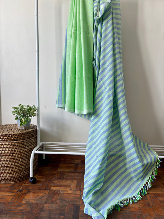 A cotton saree with green and blue stripes, and light green body
