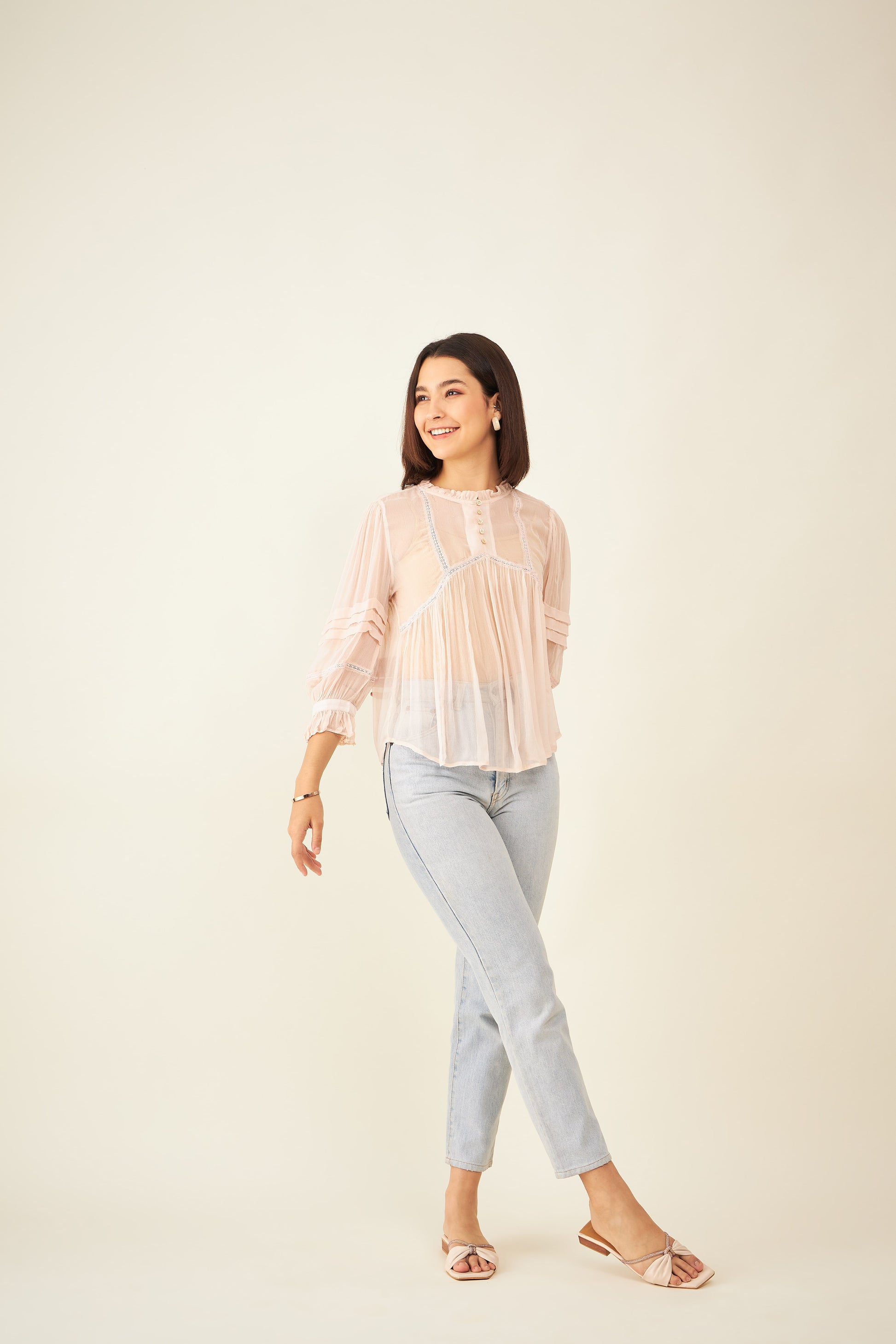 Ruffled long sleeve sheer top in blush pink