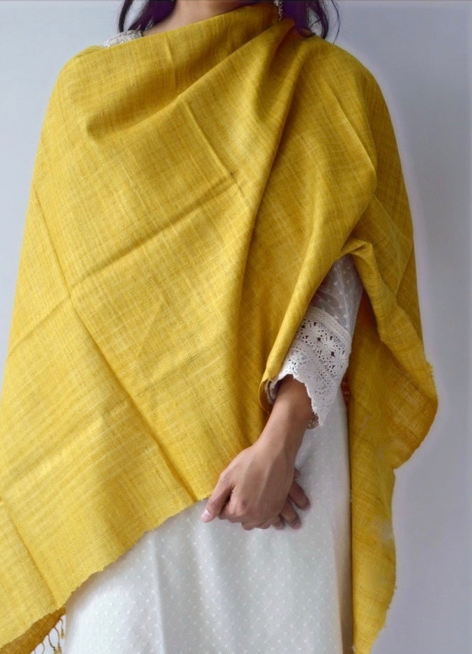 Turmeric dyed plain Eri silk scarf without motifs