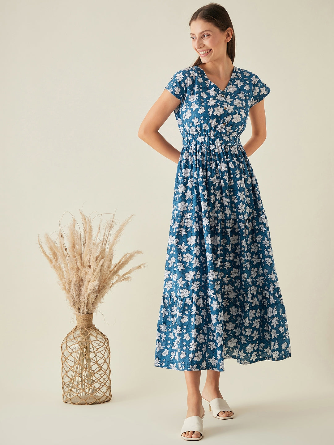 blue long tiered dress with simple floral print 