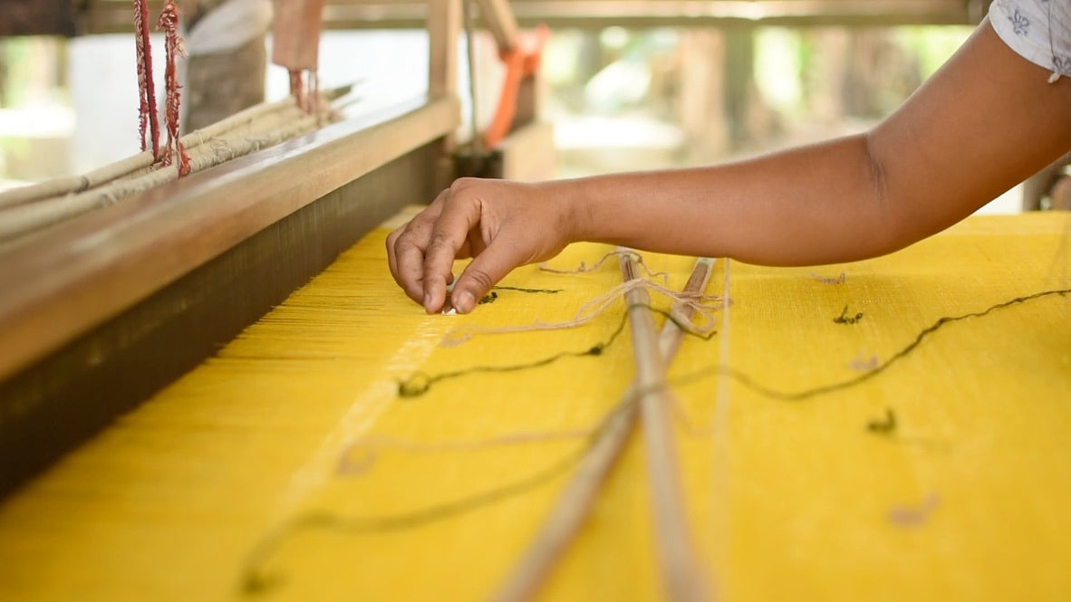 Load video: Video shows how Arras&#39;s Ahimsa/ Peace silk is crafted by hand by women in India&#39;s northeastern state of Assam. The yarn is spun by hand, dyed by hand using natural ingredients and woven on traditional looms.